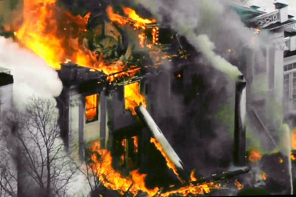 PHOTO: Flames shoot out of the a mansion ablaze in a Boston suburb, Dec. 27, 2019, in Concord, Mass., in an image from WCVB video.