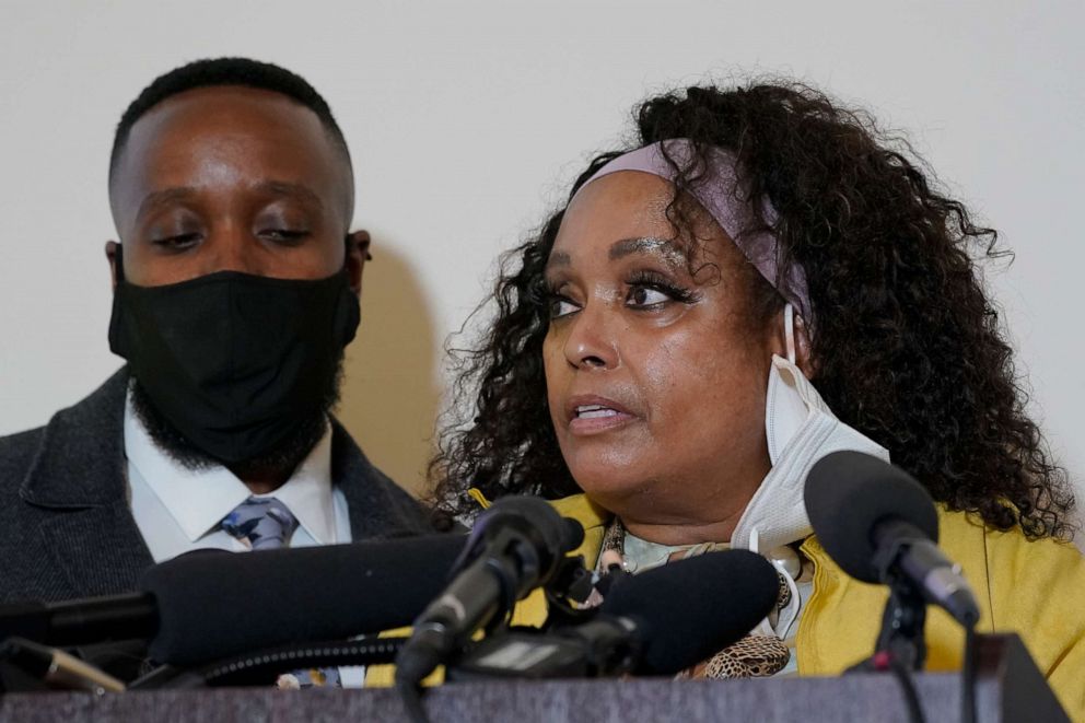 PHOTO: Marcia Carter-Patterson, right, the mother of Manuel "Manny" Ellis, stands with her son and Ellis' brother, Matthew, left, as she speaks during a press conference in Tacoma, Washington, on May 27, 2021.