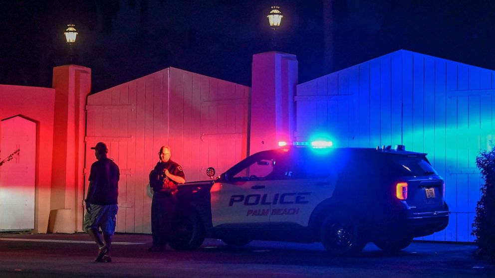 PHOTO: A police car is seen outside former U.S. President Donald Trump's Mar-a-Lago estate in Palm Beach, Florida, Aug. 8, 2022. Trump said the residence was being 