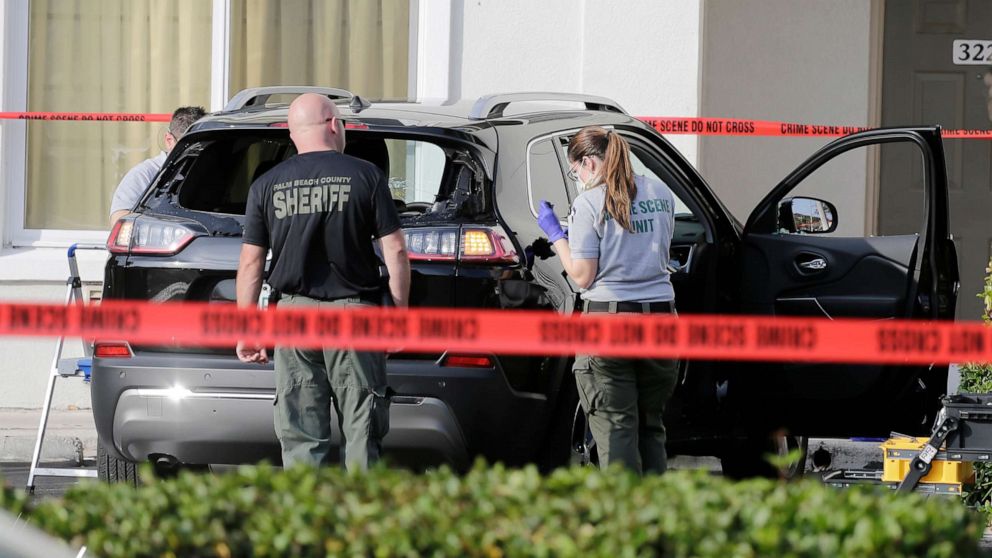 PHOTO: Forensic technicians work on the vehicle authorities say officers fired shots at, that breached security at President Donald Trump's Mar-a-Lago resort in Palm Beach, Jan. 31, 2020, in West Palm Beach, Fla.