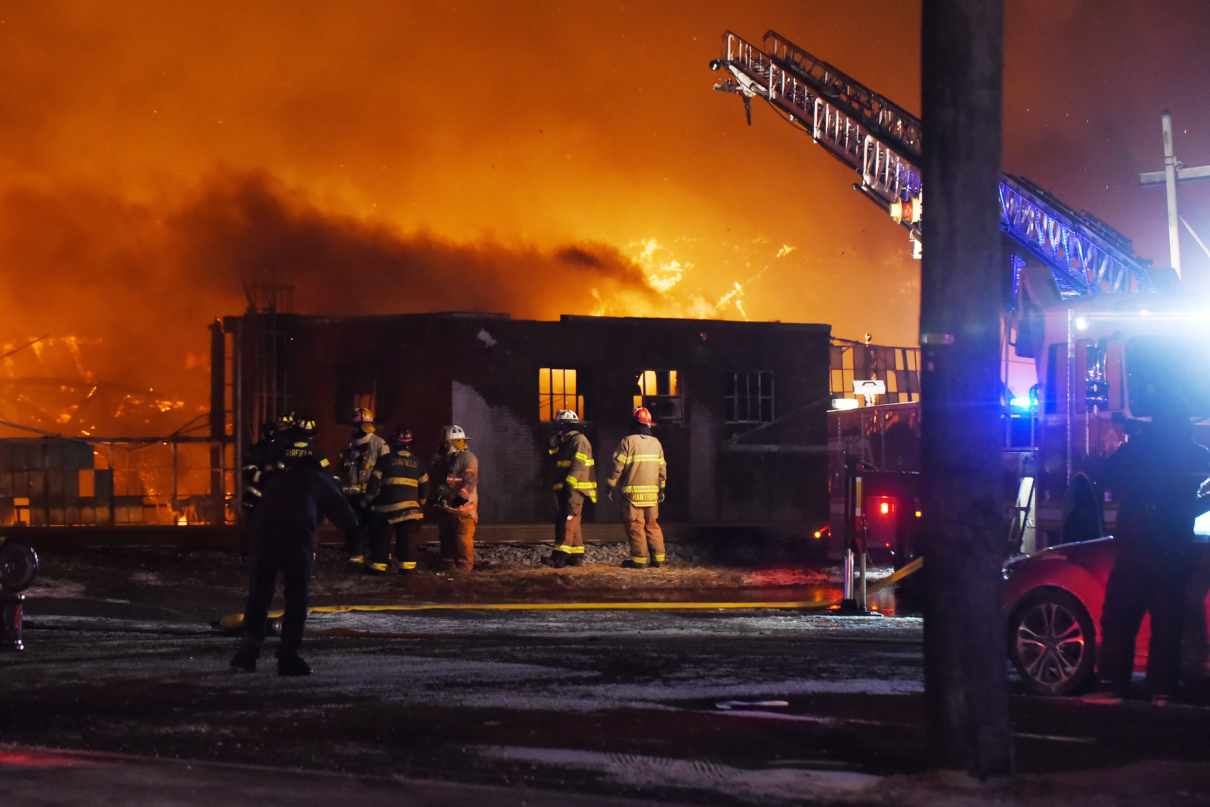 PHOTO: Firefighters battle a four alarm fire at the Marcal paper factory in Elmwood Park, N.J., Jan. 30, 2019.