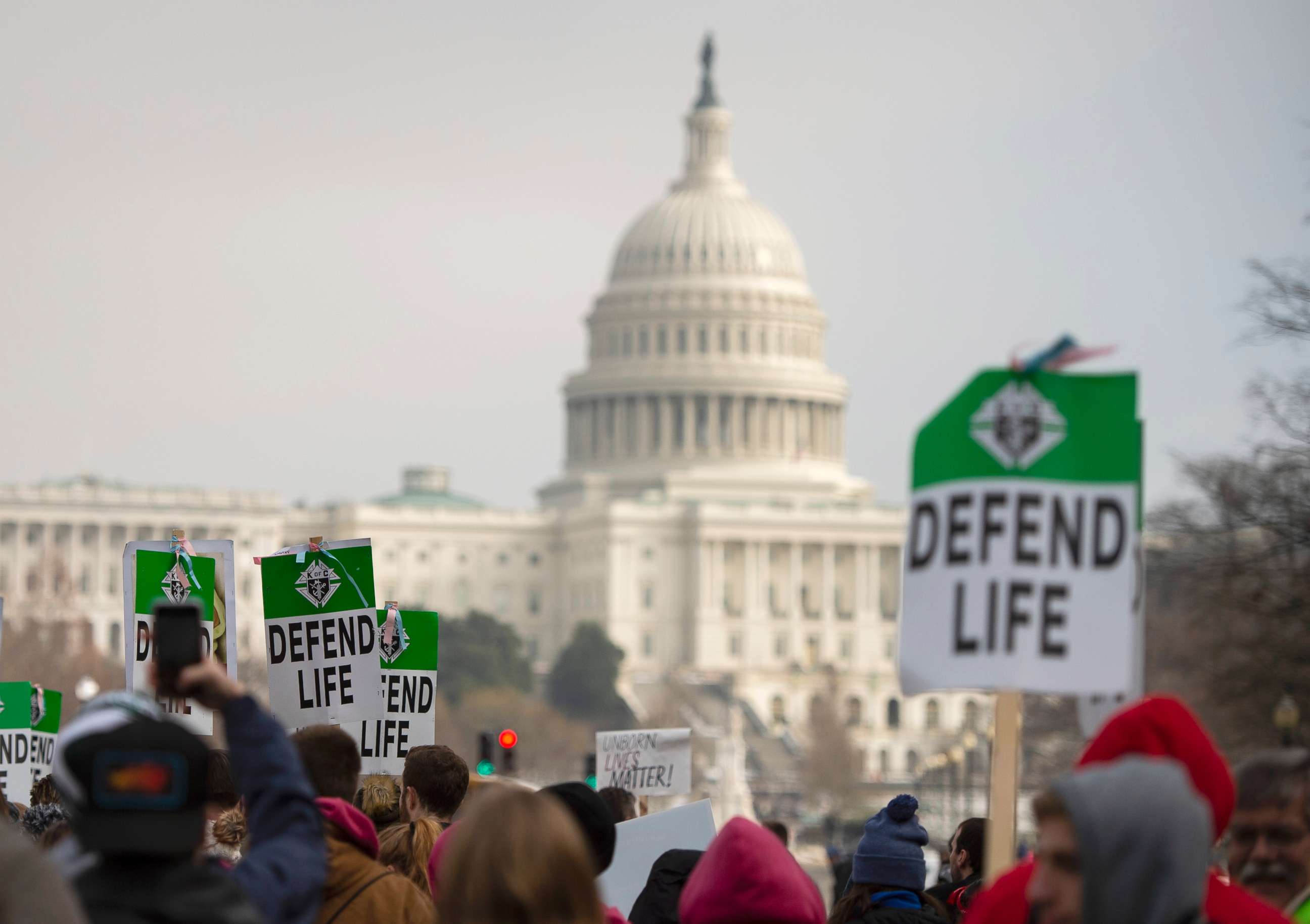 PHOTO: Students and activists carry signs during the annual "March for Life" in Washington, DC, Jan. 18, 2019.