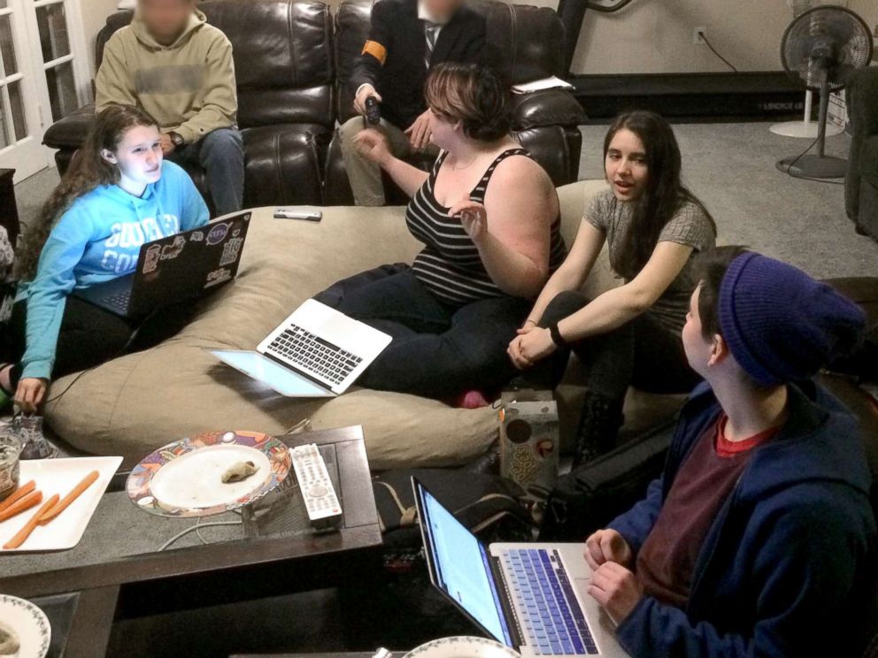 PHOTO: Maryland high school students Michaela Hoenig, Mai Canning and Gabrielle Zwi, left to right, hold a planning session for the March for Our Lives.