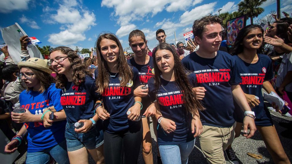 PHOTO: Marjory Stoneman Douglas High School students march from Pine Trails Park to Marjory Stoneman Douglas during the March for Our Lives protest in Parkland, Fla., March 24, 2018.