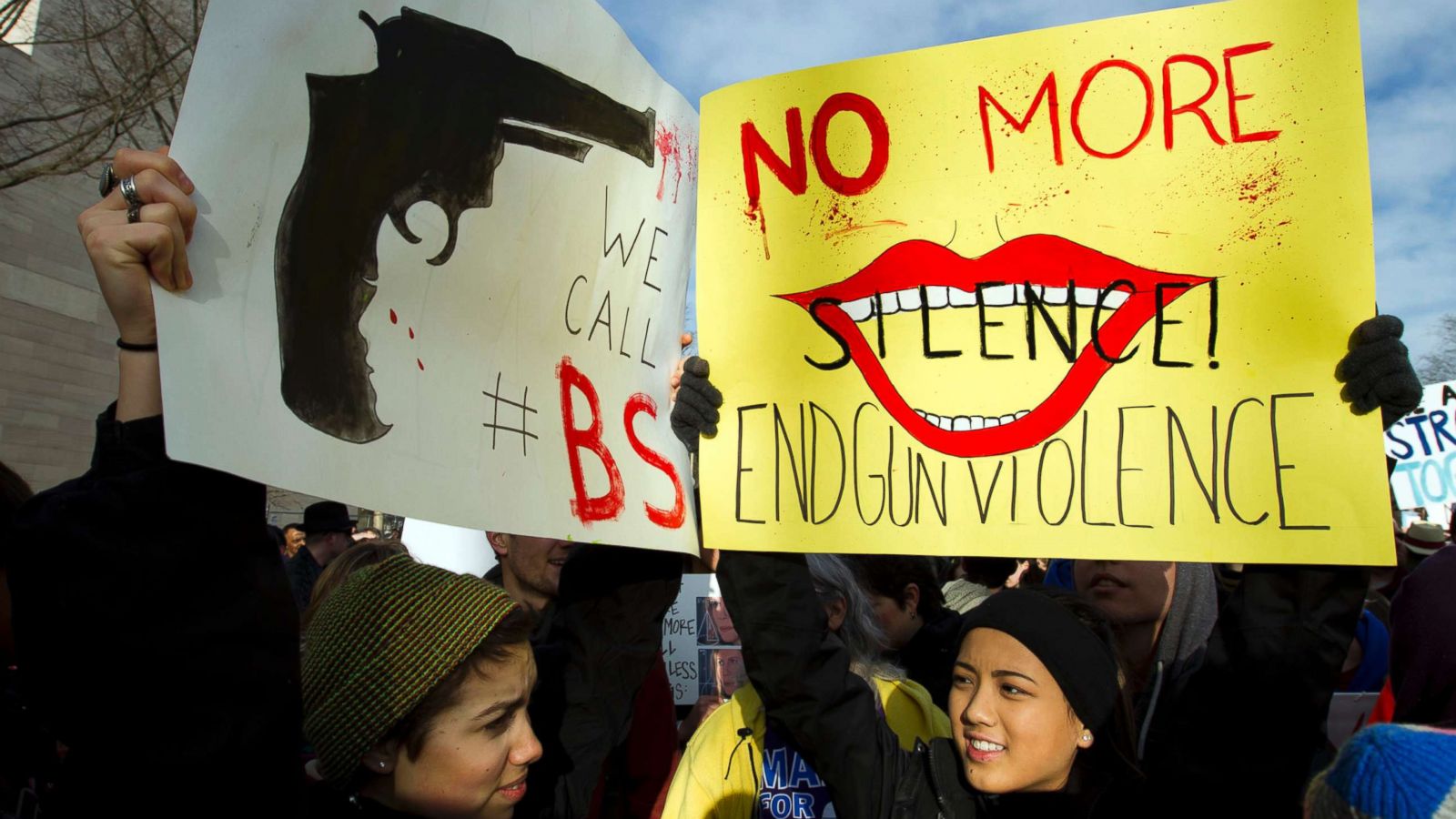 PHOTO: Sofia Briceno, left, and Josie Dang, hold banners during the March for Our Lives rally in support of gun control in Washington, D.C., March 24, 2018.