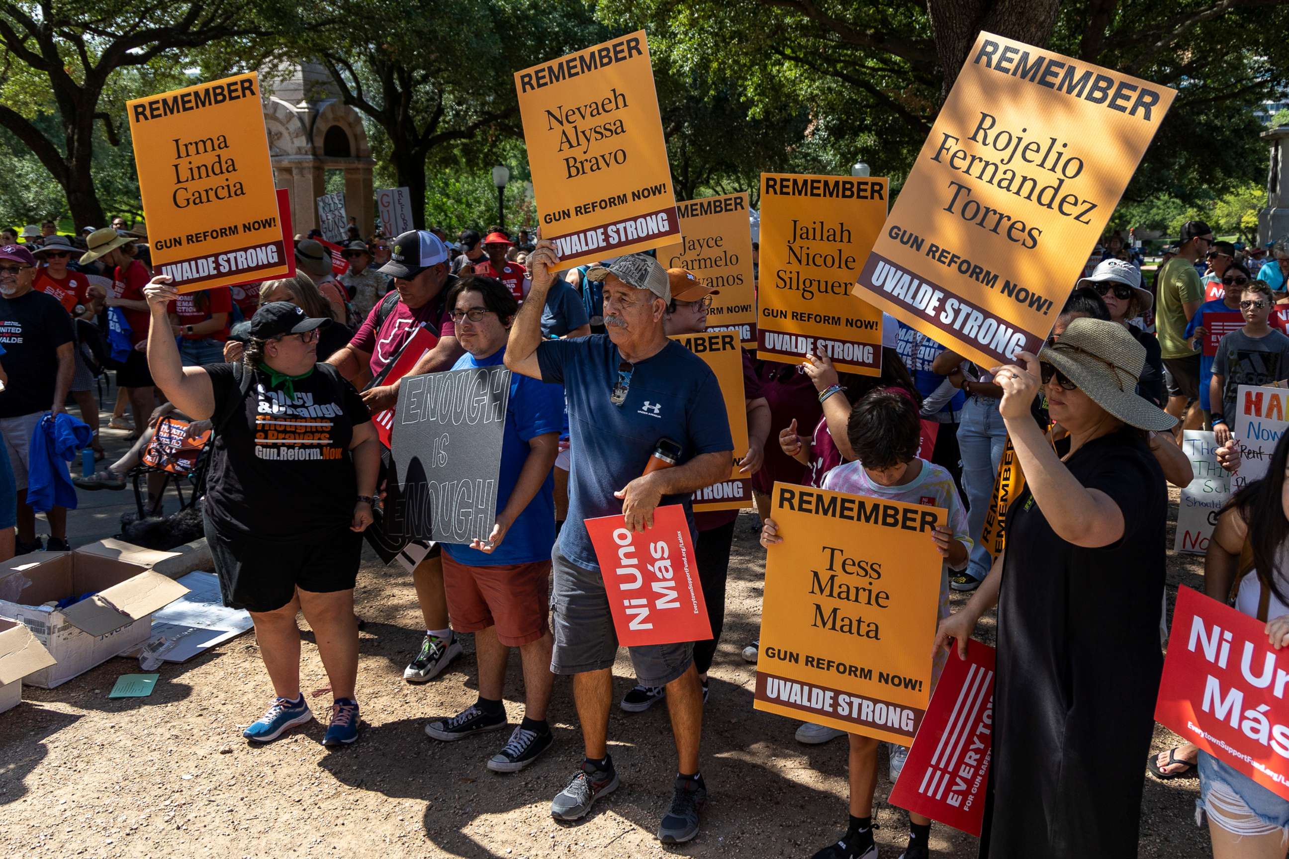 PHOTO: Joe Martinez, center, stands with other attendees to remember the victims of the Uvalde school shooting during a March for our Lives rally at the Texas State Capitol, Aug. 27, 2022, in Austin, Texas.