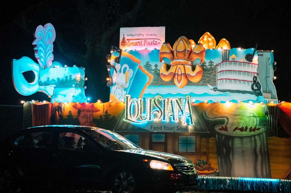 PHOTO: Vehicles line up to view Mardi Gras floats at the Vehicles line up to view Mardi Gras floats at the Float in the Oaks event in City Park, Feb. 14, 2021, in New Orleans, Louisiana.