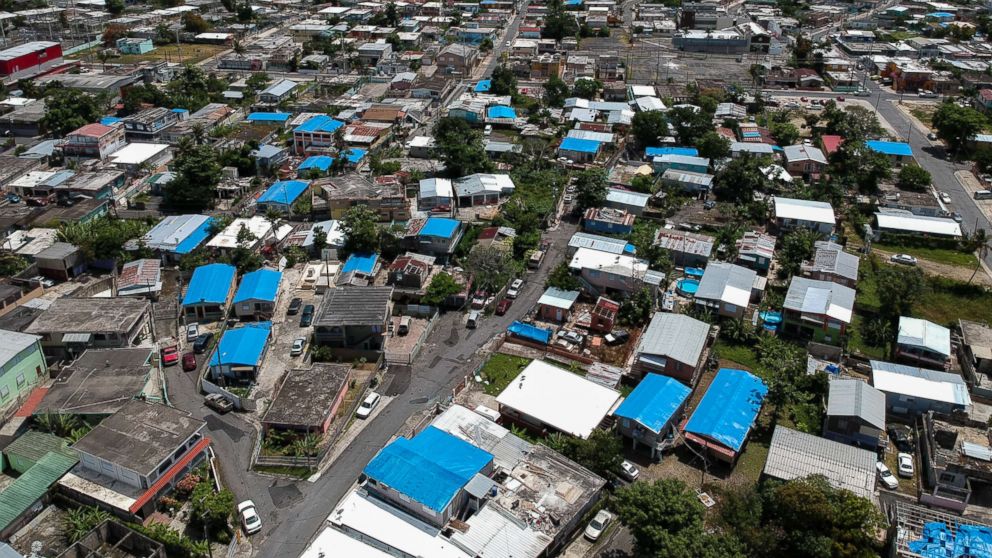This June 18, 2018, photo shows an aerial view of the Amelia neighborhood in the municipality of Catano, east of San Juan, Puerto Rico.