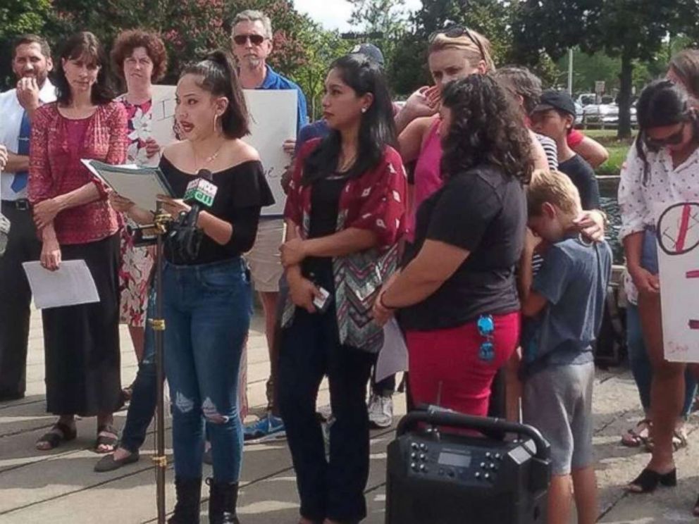 PHOTO: Maria (center, in red top) recounts the story of her arrest in a statement shared by Elisa Hernandez of Alerta Migratoria, an immigrants' rights group based in North Carolina. 