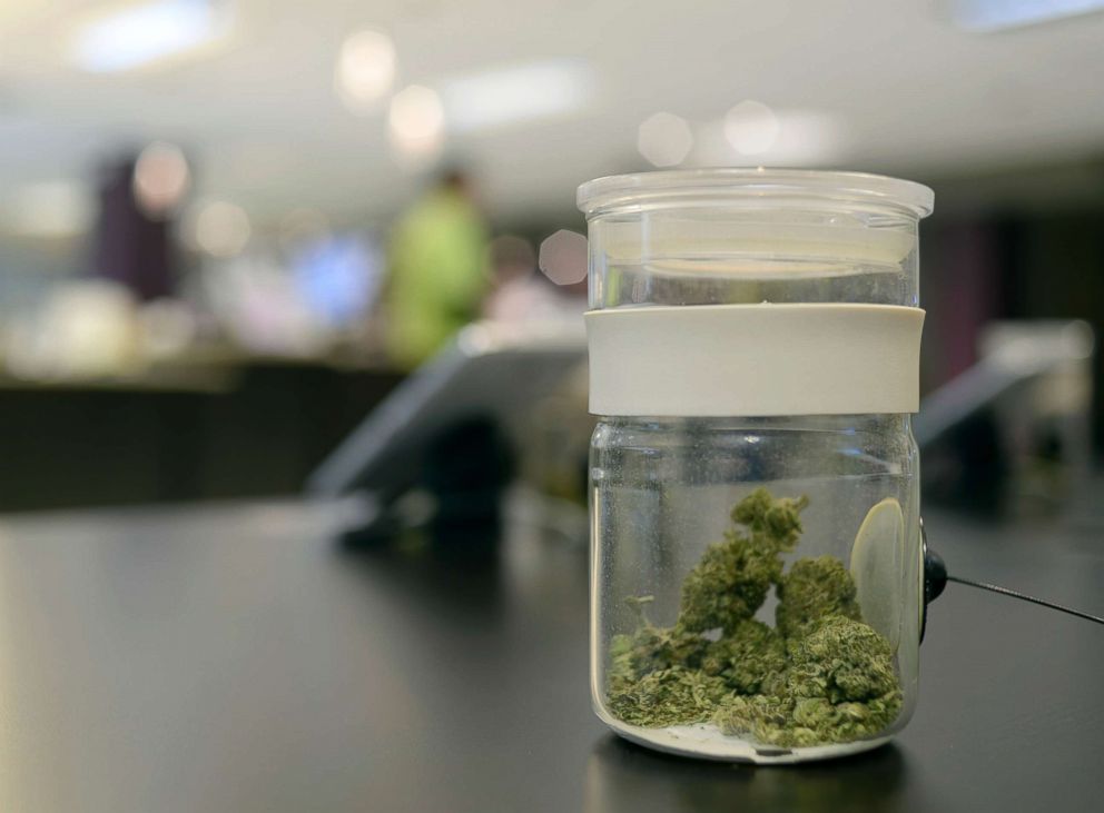 PHOTO: A sample of marijuana is in a jar at Euflora Dispensary in Denver, March 11, 2015.