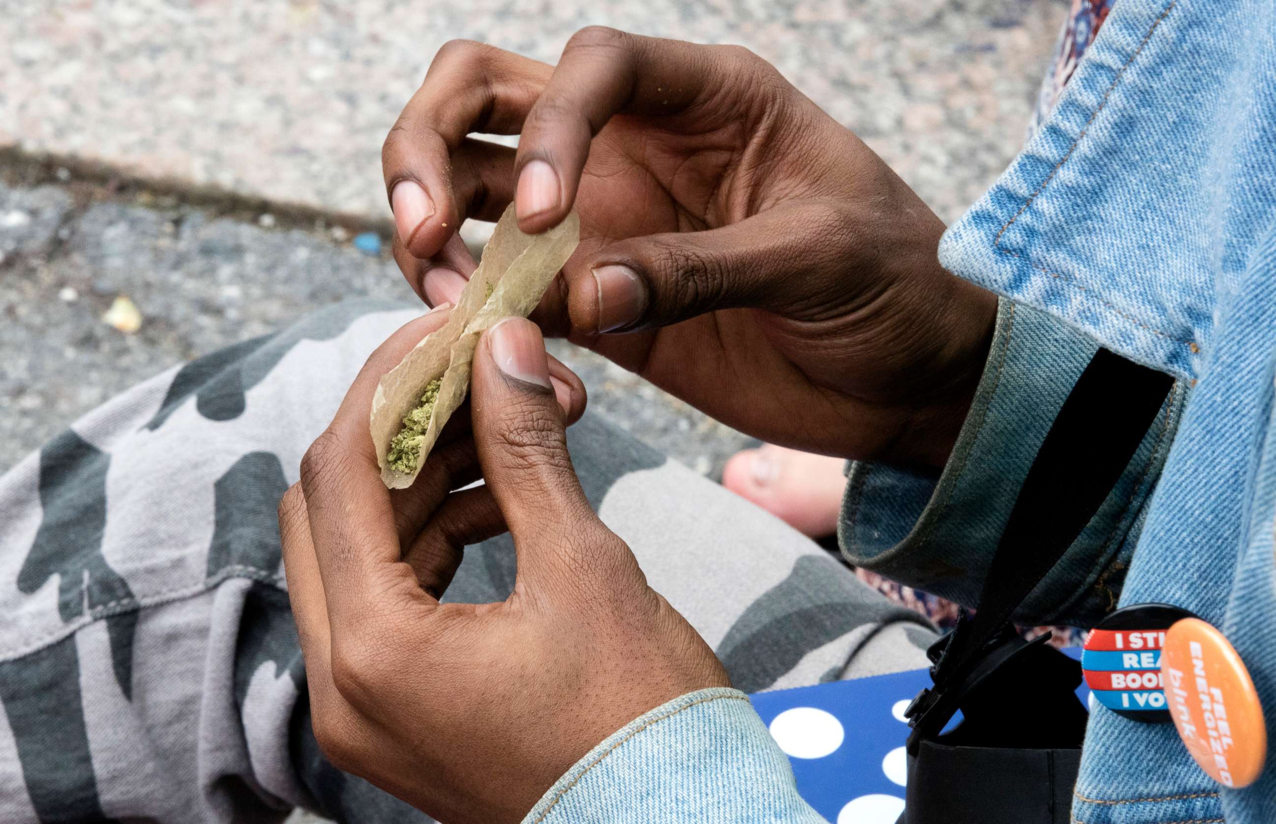 PHOTO: A man rolls cannabis during the annual NYC Cannabis Parade & Rally in support of the legalization of marijuana for recreational and medical use at Union Square, May 7, 2016, in New York City.