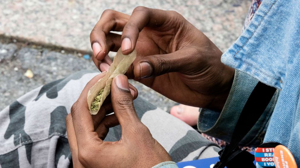 PHOTO: A man rolls cannabis during the annual NYC Cannabis Parade & Rally in support of the legalization of marijuana for recreational and medical use at Union Square, May 7, 2016, in New York City.