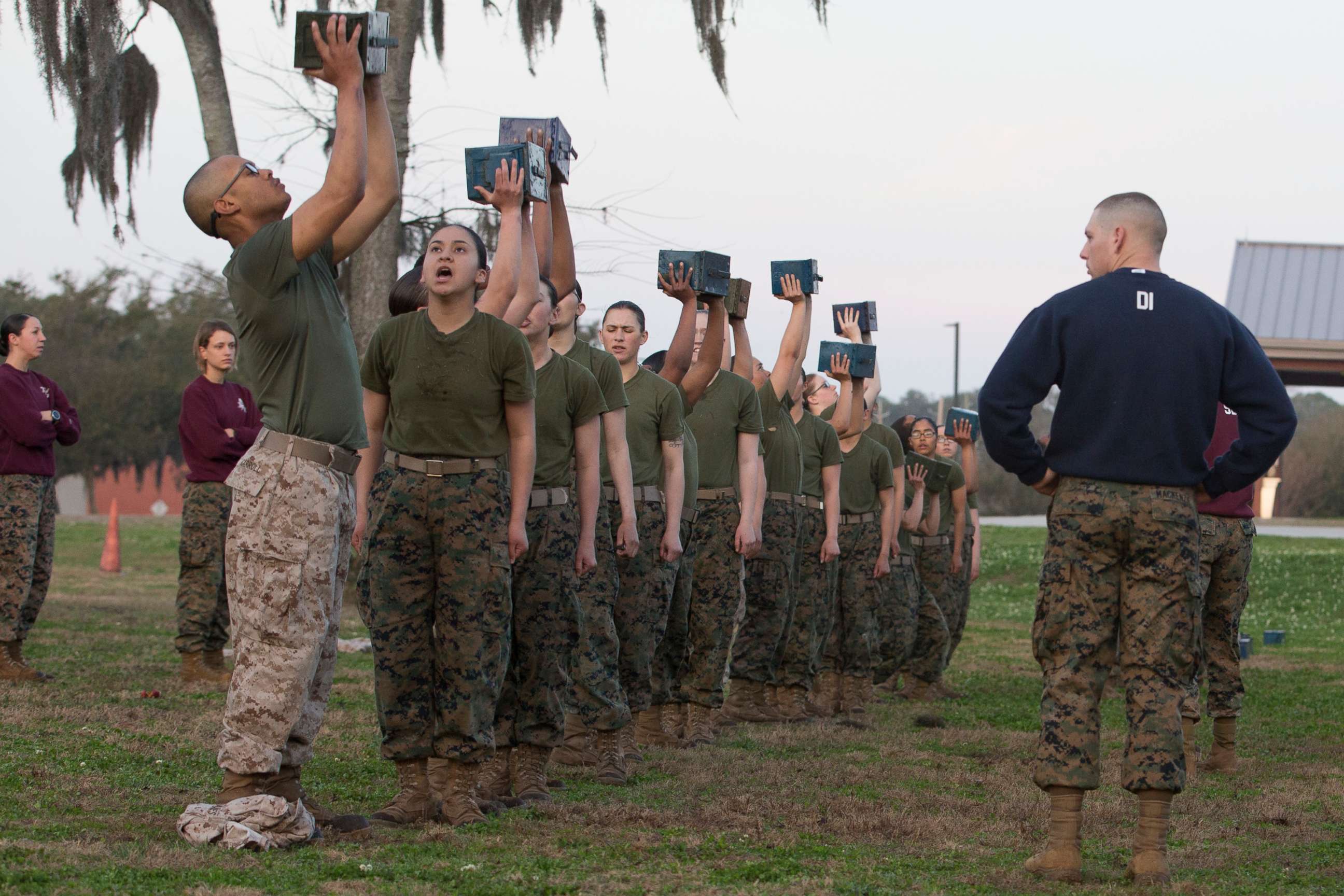 PHOTO: Marine Corps Recruits lift ammunition cans during the Combat Fitness Test on Marine Corps Recruit Depot, Parris Island, S.C., Feb. 15, 2018.