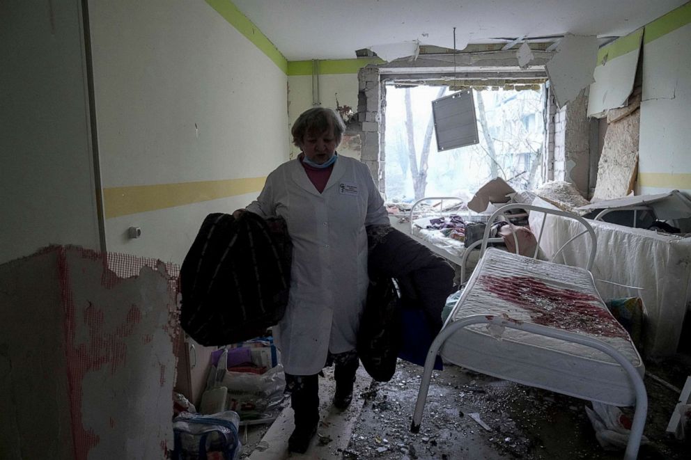PHOTO: A medical worker walks through the damaged maternity hospital in Mariupol, Ukraine, March 9, 2022.