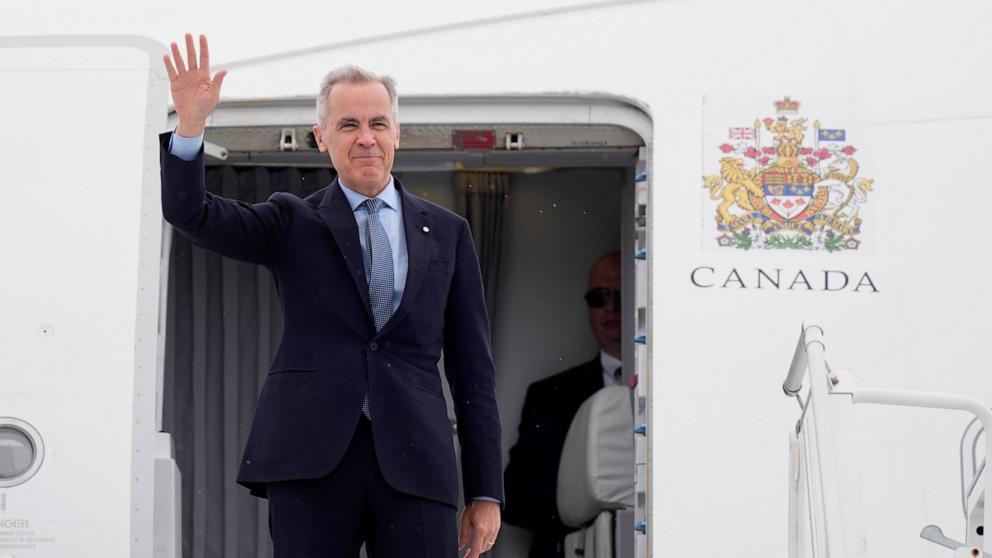PHOTO: Canadian Prime Minister Mark Carney boards a government plane in Ottawa, Ontario, May 5, 2025, en route to Washington for a meeting with President Donald Trump on Tuesday.