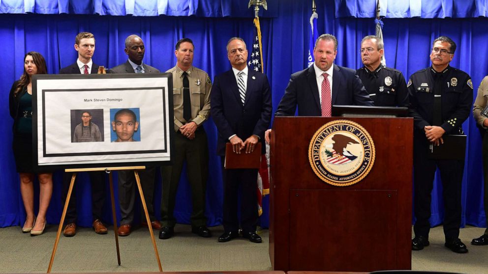 FBI Special Agent in Charge Ryan Young briefs the media beside photos of a suspect arrested in connection with an alleged terror plot targeting Southern California sites on April 29, 2019, in Los Angeles.