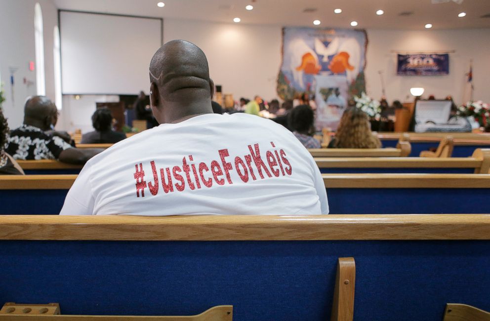 PHOTO: Stephen Lewis, 29, wears a t-shirt calling for justice for the death of Markeis McGlockton while attending his funeral at Shiloh Missionary Baptist Church in Largo, Fla., July 28, 2018.