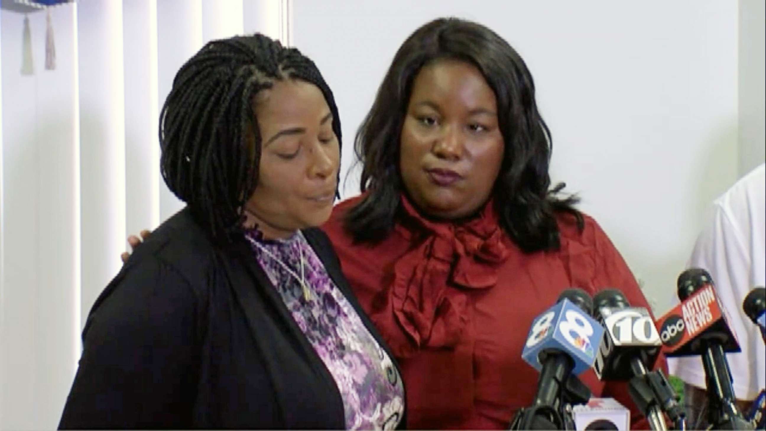 PHOTO: Monica Moore, the mother of Markeis McGlockton, is comforted by family attorney Michele Rayner during a press conference on July 24, 2018 in Clearwater, Fla.