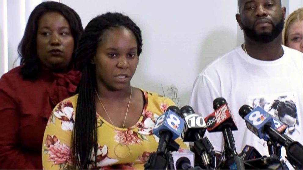 PHOTO: Britany Jacobs speaks of the fatal shooting of her boyfriend Markeis McGlockton as his father, Michael McGlockton and family attorney Michele Rayner, look on in Clearwater, Fla., July 24, 2018.