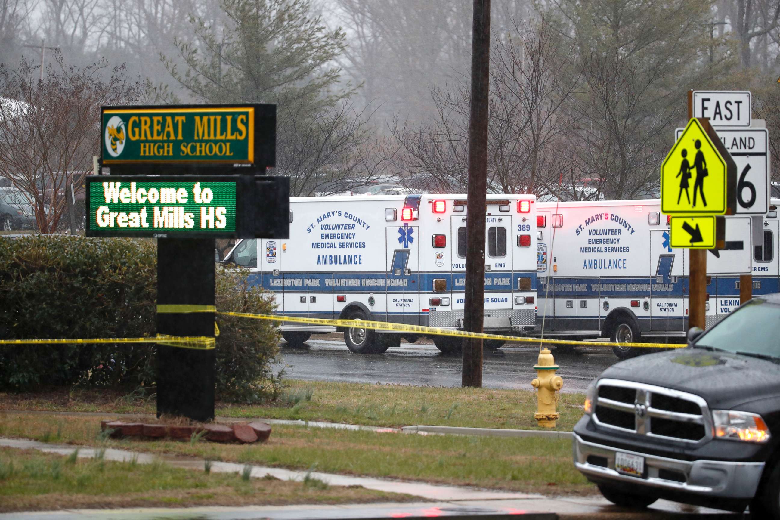 PHOTO: Deputies, federal agents and rescue personnel, converge on Great Mills High School, the scene of a shooting, March 20, 2018 in Great Mills, Md. 
