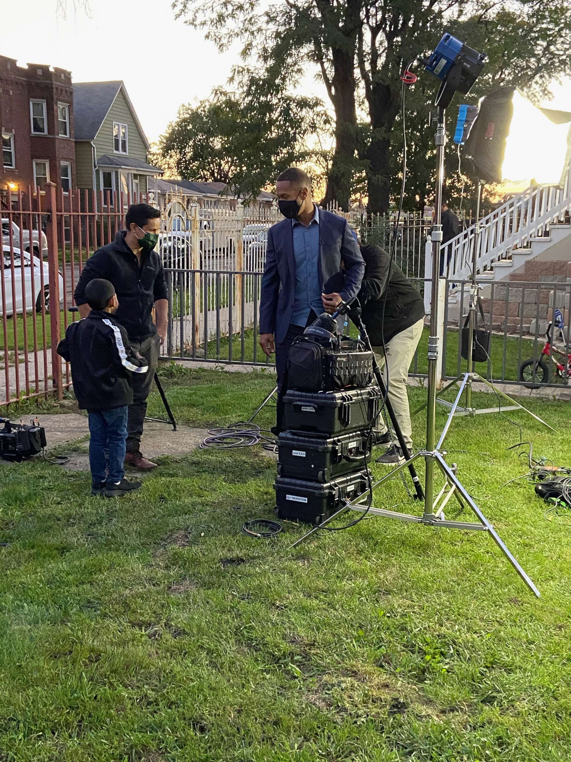 PHOTO: ABC News' Alex Perez and Armando Garcia prepare to interview Alfredo Diaz and his family at their home in Chicago, Illinois.