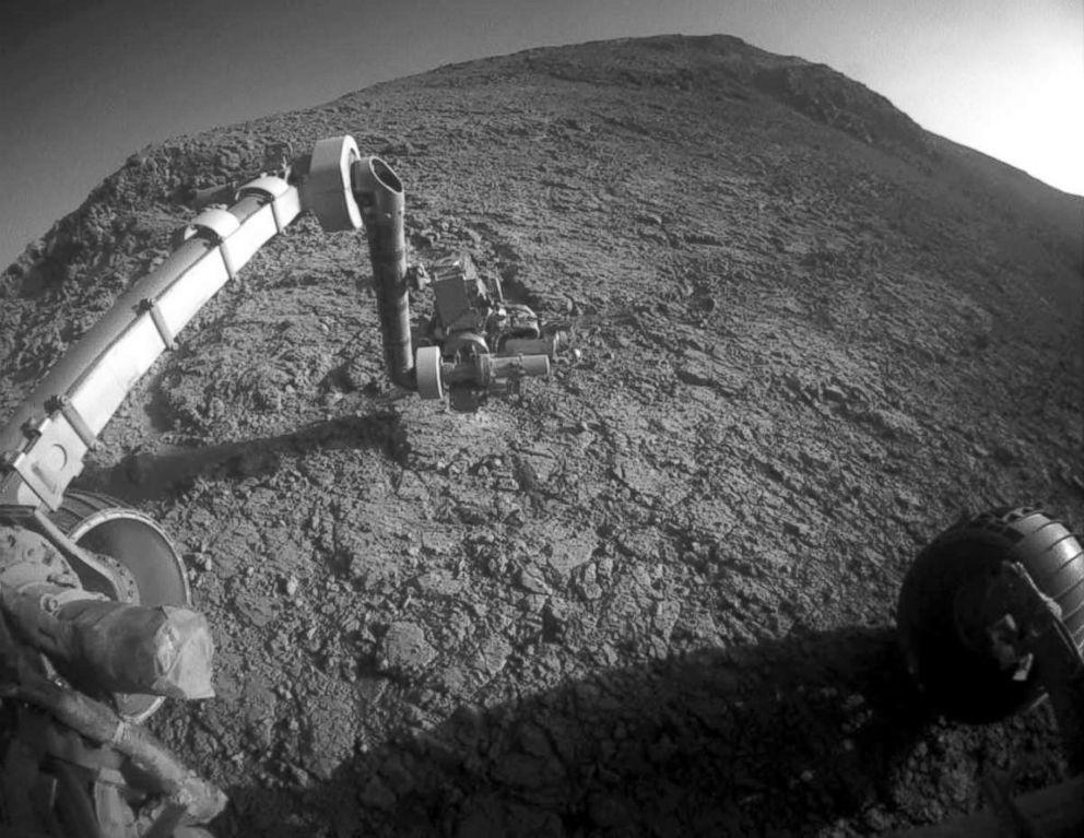 PHOTO: The tool turret at the end of the the Opportunity rover's robotic arm on the southern side of "Marathon Valley," which goes through the western rim of Endeavour Crater.