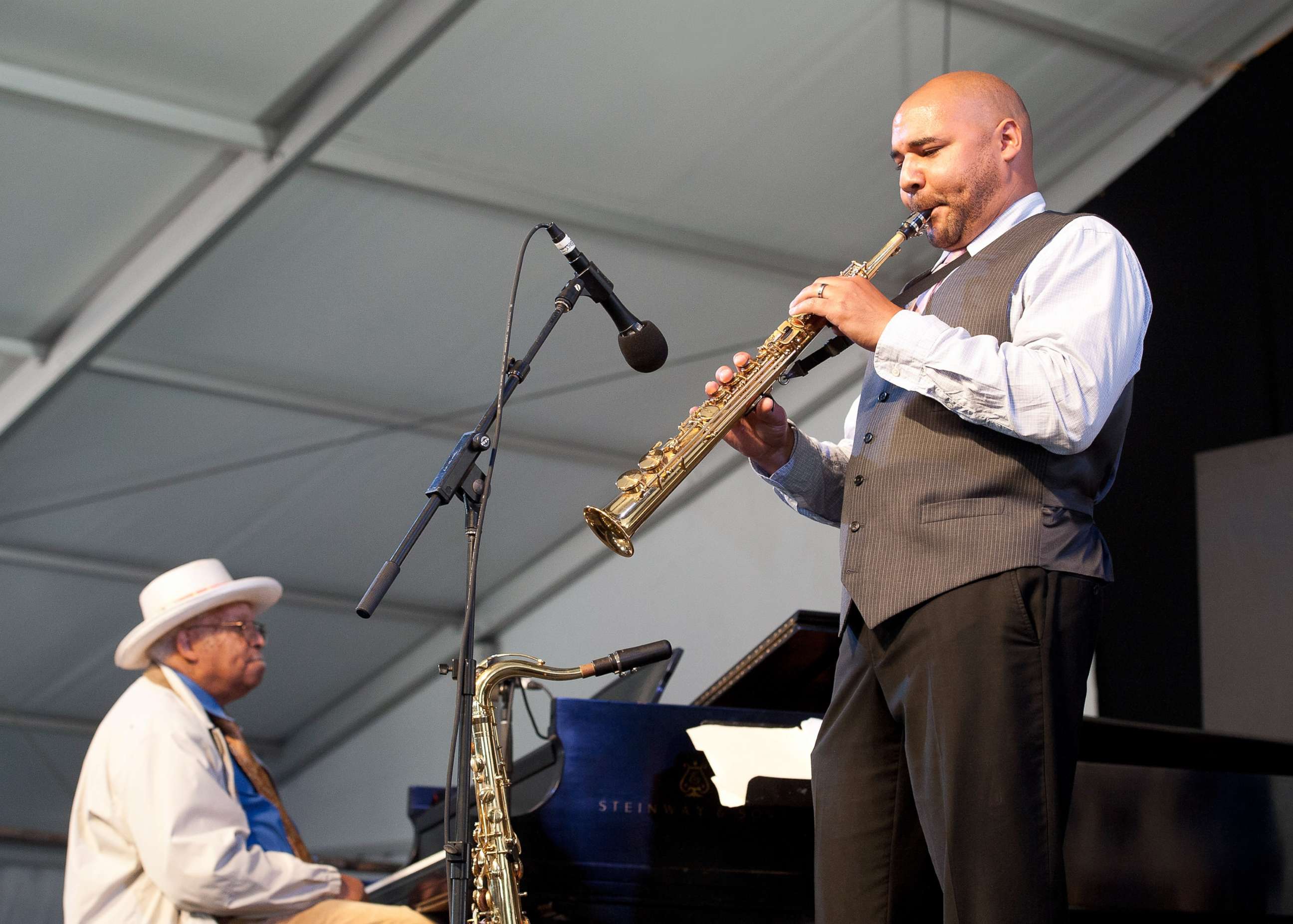 PHOTO: Left, Ellis Marsalis and Derek Douget perform during the 2013 New Orleans Jazz & Heritage Music Festival at Fair Grounds Race Course on May 5, 2013, in New Orleans.