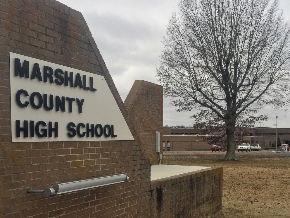 PHOTO: Authorities investigate the scene of fatal school shooting, Jan 23, 2018, in Benton, Ky.