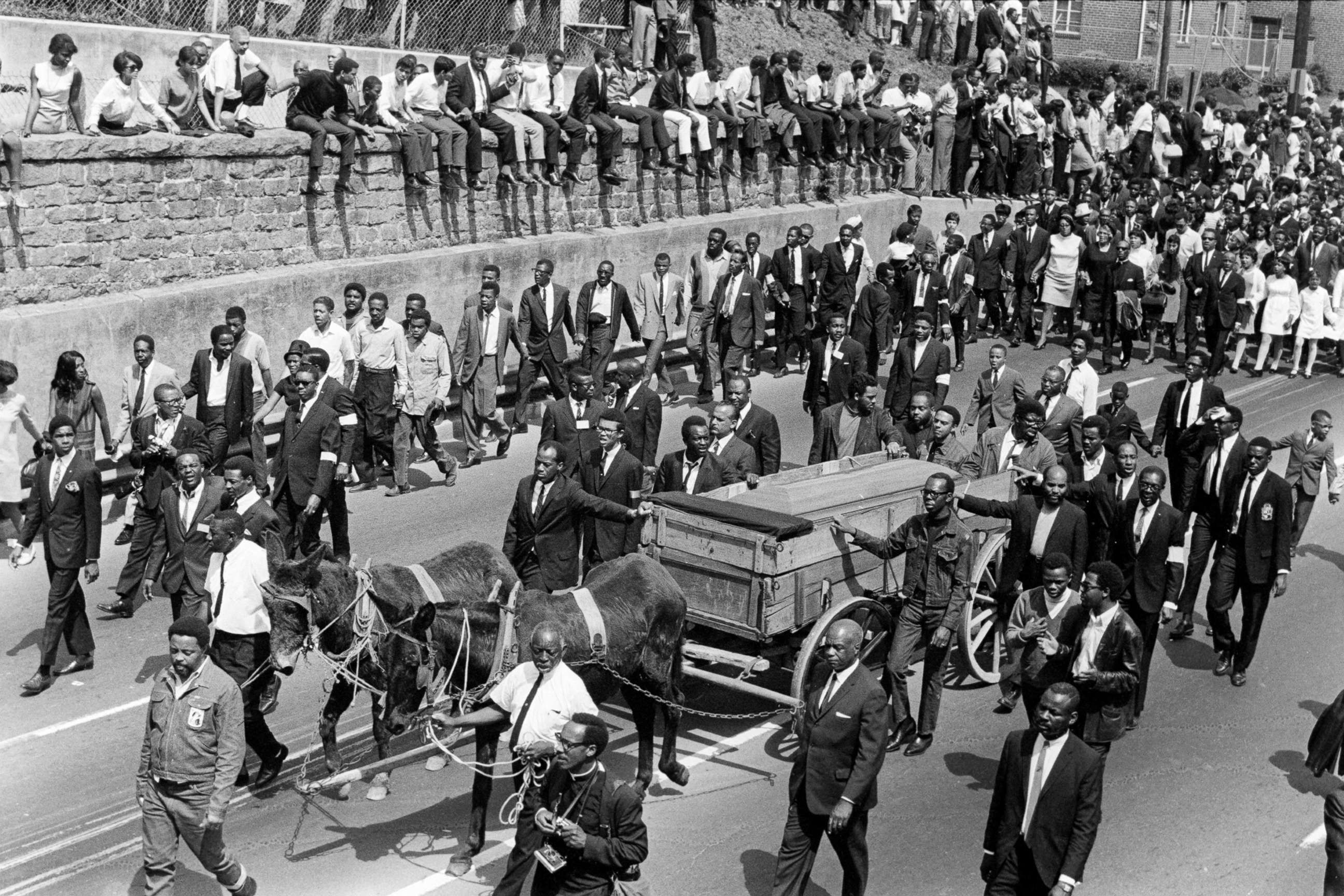 PHOTO: View of the casket of the Reverend Martin Luther King, Jr loaded onto a wooden farm wagon and pulled by mules during his funeral procession in Atlanta, Georgia, April 9, 1968. 