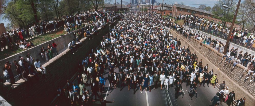 PHOTO: Funeral procession of 1300 people walking from Ebenezer Baptist Church to Morehouse College in honor of Martin Luther King, Jr., Atlanta. April 9, 1968. 