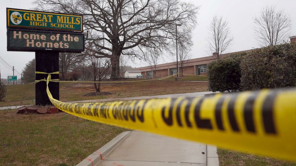 PHOTO: Crime scene tape is used around Great Mills High School after a shooting on March 20, 2018, in Great Mills, Md.