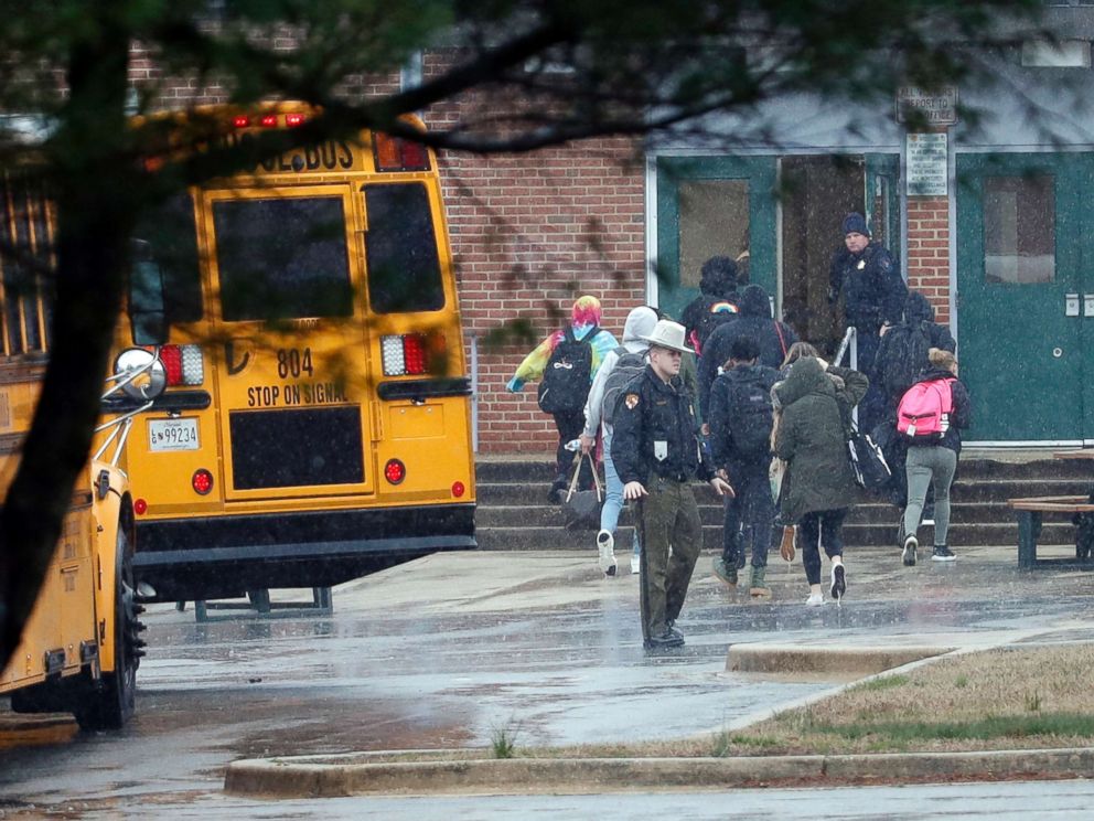 PHOTO: Police move students into a different area of Great Mills High School, the scene of a shooting, March 20, 2018 in Great Mills, Md. 