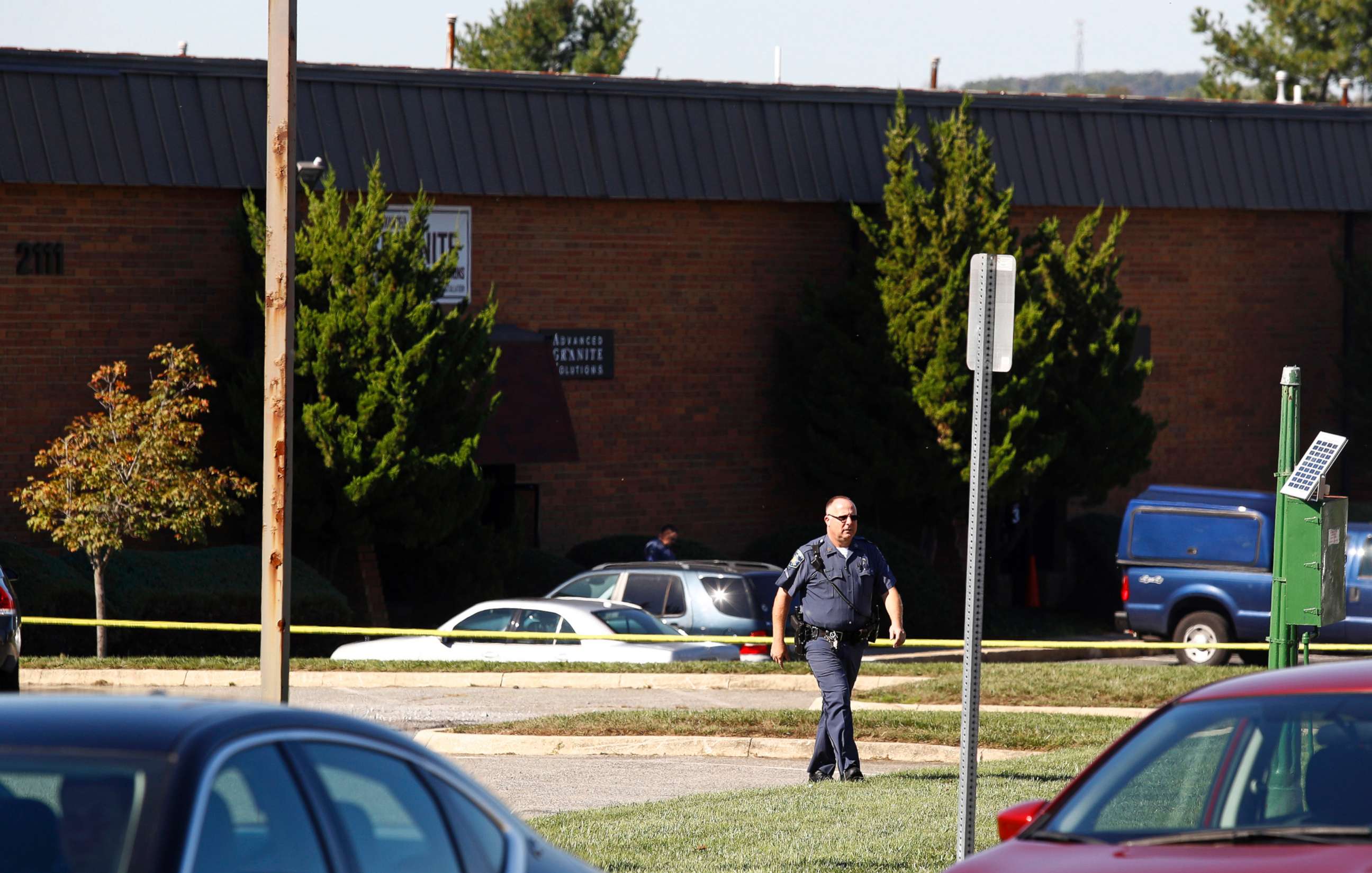 PHOTO: A law enforcement official walks away from the scene of a fatal shooting at a business park in the Edgewood area of Harford County, Md., Oct. 18, 2017.