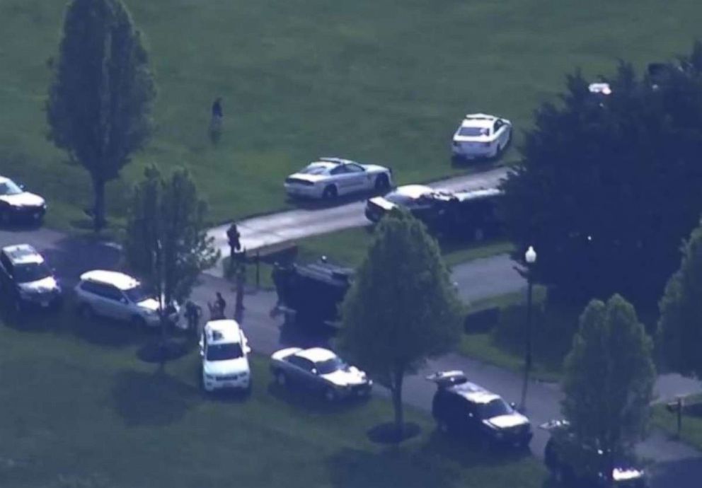 Dozens of police and SWAT teams amassed near the home of a man in Brookeville, Md., after he allegedly killed three people on Monday, May 7, 2018.