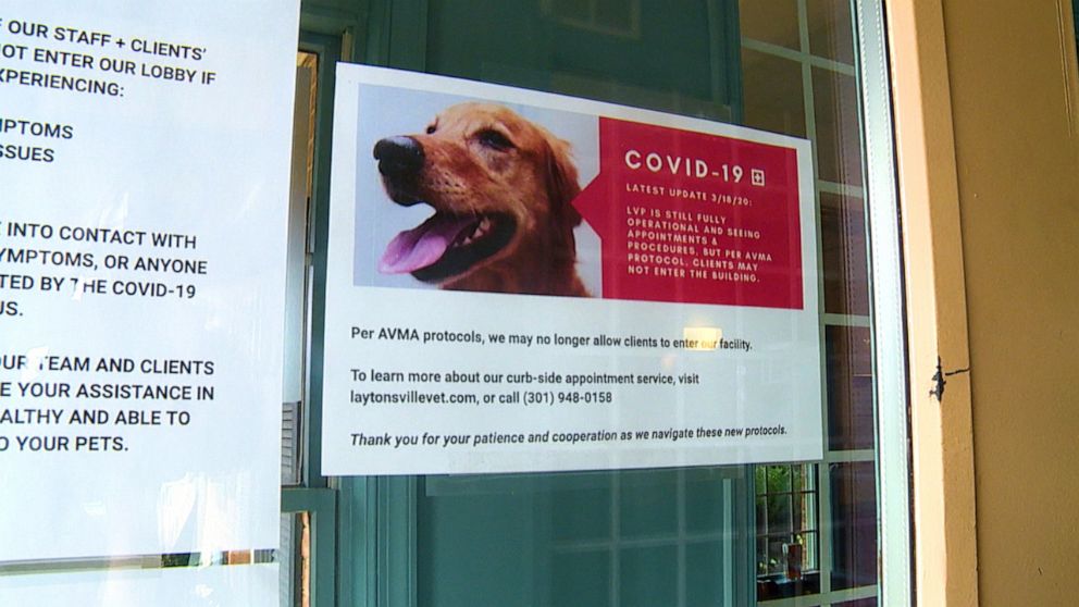 PHOTO: Signs posted at the door to the Laytonsville Veterinary Practice in Maryland inform pet owners of new protocols currently being utilized at the clinic amid the COVID-19 pandemic.