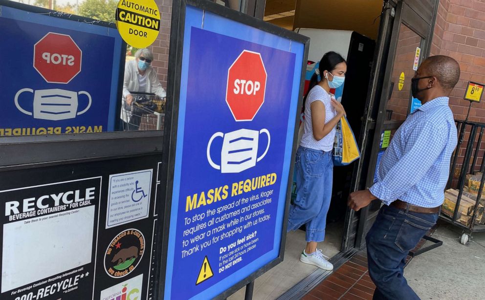 PHOTO: People shop at a grocery store enforcing the wearing of masks in Los Angeles on July 23, 2021.