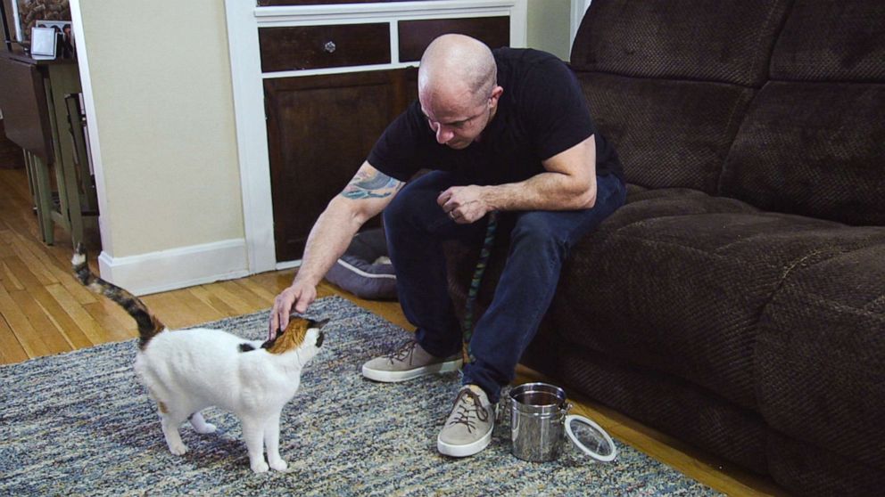 PHOTO: An undated photo shows Mason Caminiti petting a cat.