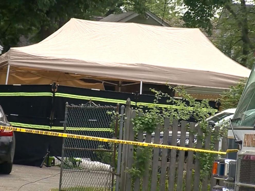 PHOTO: Authorities have erected a tent where three dead bodies have been discovered at a Massachusetts home associated with a kidnapping suspect.