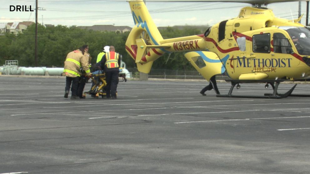 PHOTO: First responders participate in a mass casualty drill, practicing transporting the most severe victims via airlift.