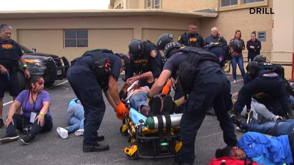 PHOTO: In this mock scenario, real-life SWAT team members, police officers, fire department and trauma teams treat "victims," who were actors covered in make-up and fake blood.