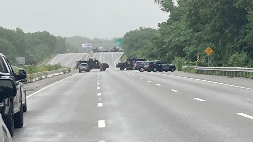 PHOTO: Massachusetts state police respond to group of armed men blocking Interstate 97 in Wakefield, Mass., July 3, 2021.