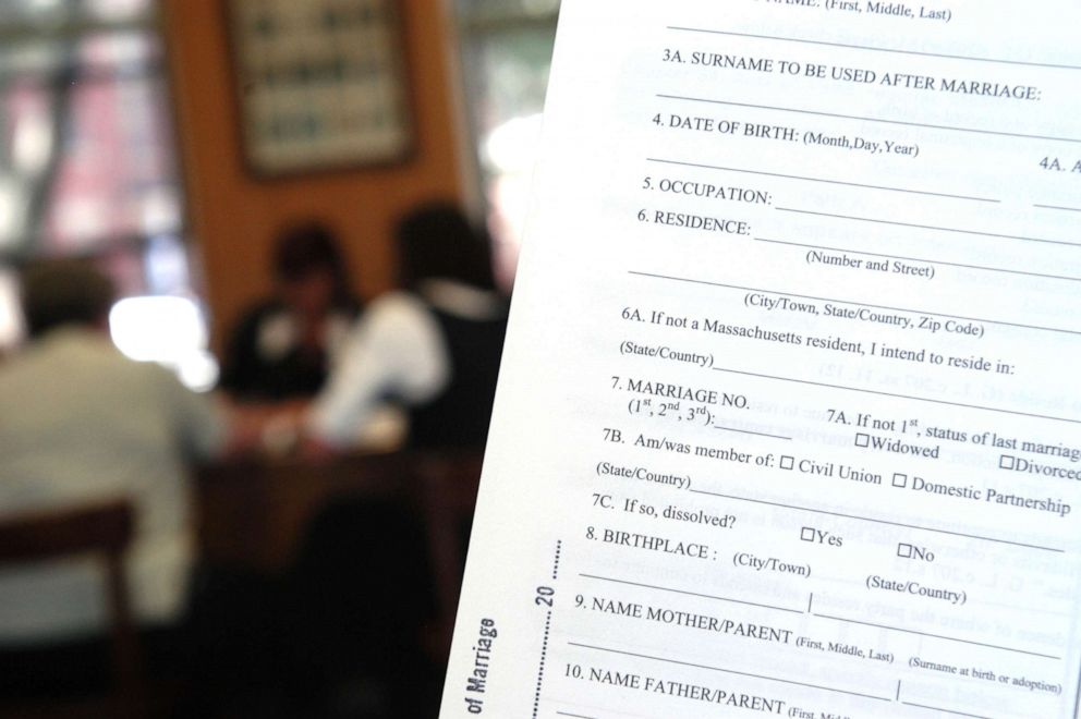 PHOTO:Same-sex couples fill out questions about residency on their application forms as they apply for marriage licenses at the City Clerk's office in Northampton, Mass., May 17, 2004.