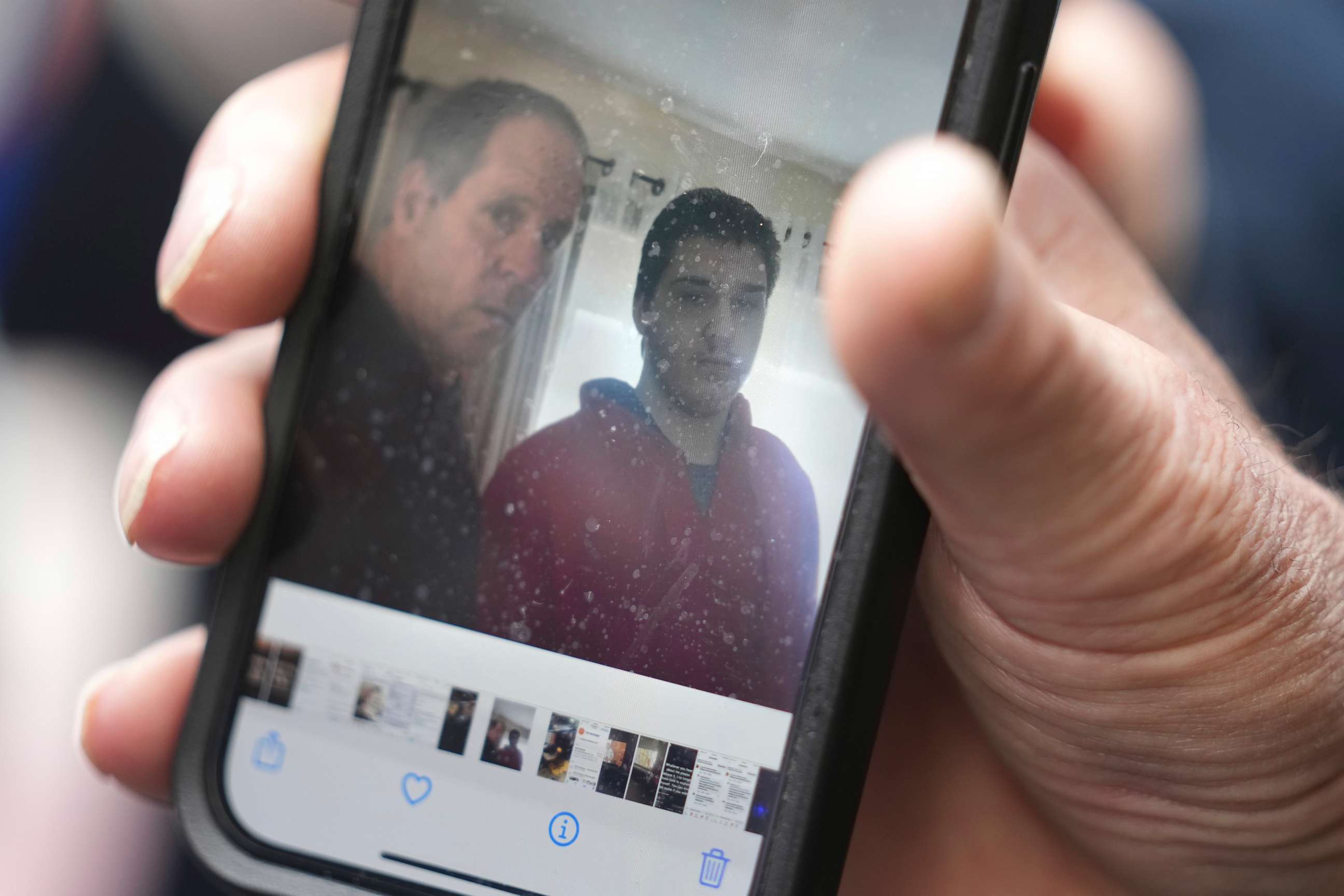 PHOTO: Paul Ventura, father of 18-year-old Mateo Ventura, both of Wakefield, Mass., displays a photograph on his cell phone that shows what he describes as a photo of himself and his son Mateo, right.