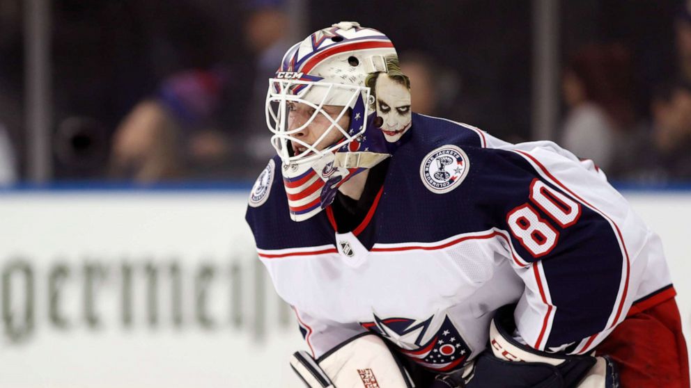 PHOTO: In this Jan. 19, 2020, file photo, Columbus Blue Jackets goaltender Matiss Kivlenieks is shown during the second period of an NHL hockey game in New York.