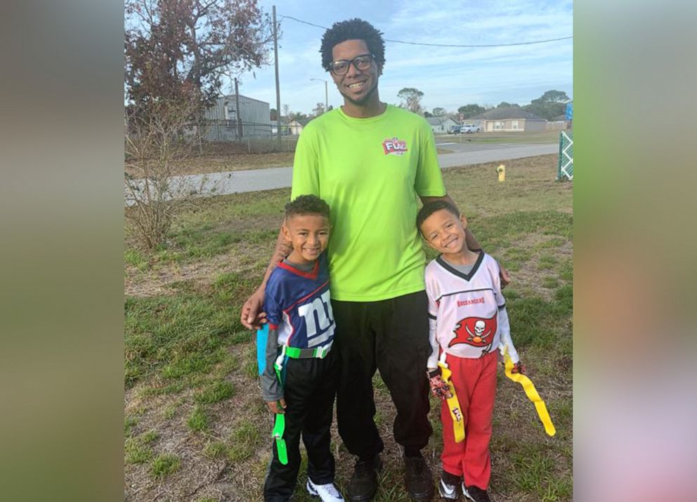 PHOTO: Matt Holland of Central Florida, is pictured with his sons in an undated handout photo.