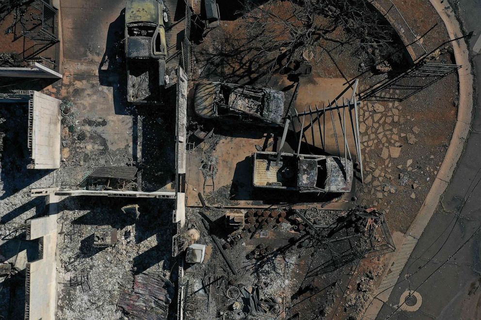 PHOTO: An aerial image shows destroyed homes and vehicles after a wind driven wildfire burned from the hills through neighborhoods to the Pacific Ocean, as seen in the aftermath of the Maui wildfires in Lahaina, Hawaii, on August 17, 2023.