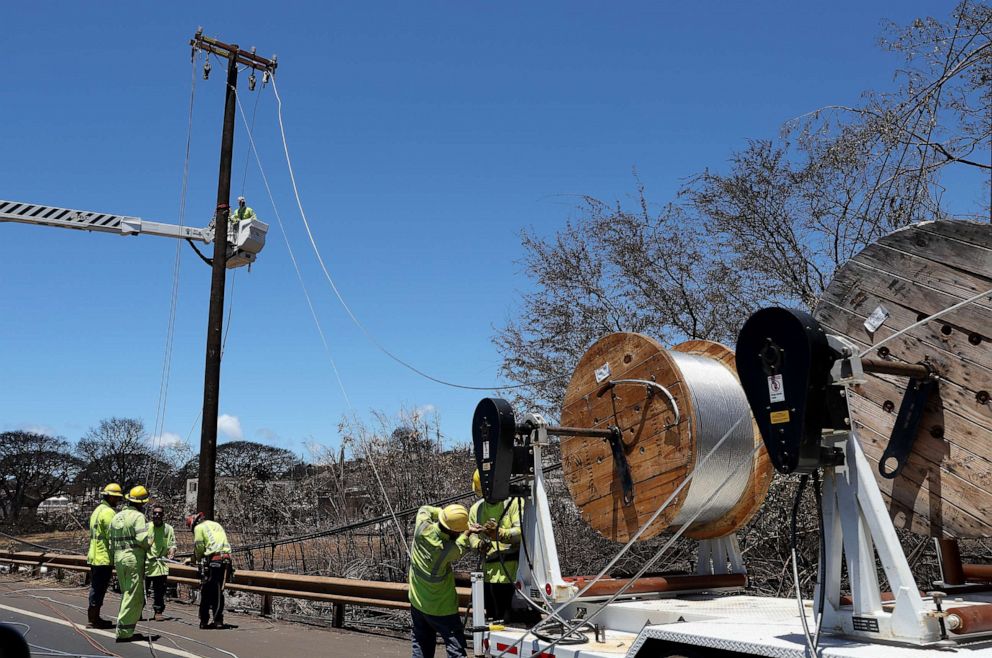 PHOTO: Hawaii Electric workers make repairs to electrical lines on Aug. 17, 2023 in Lahaina, Hawaii.