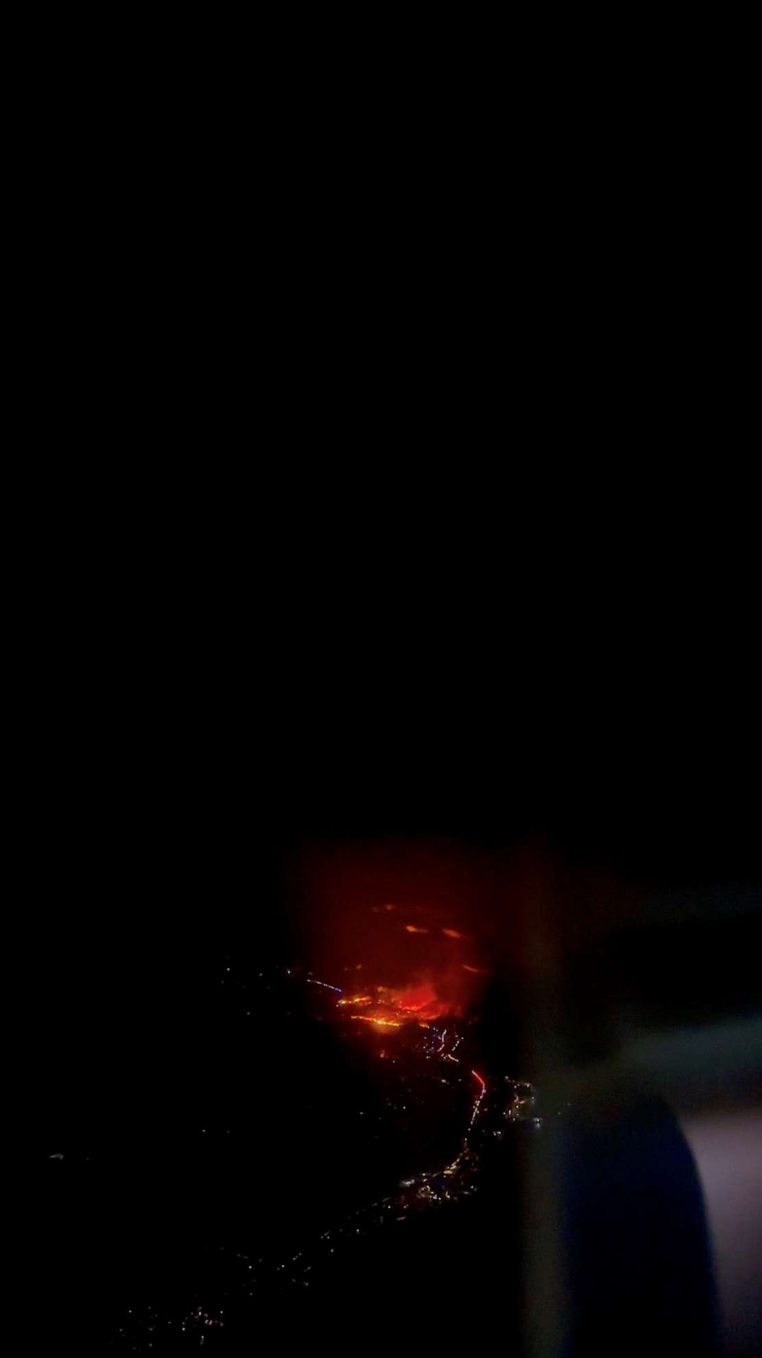 PHOTO: An aerial view shows a wildfire in Maui County, Hawaii, August 8, 2023 in this screen grab obtained from a social media video.