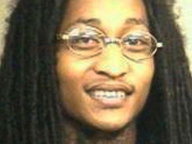 Police: Man in a wheelchair charged with killing 3 relatives