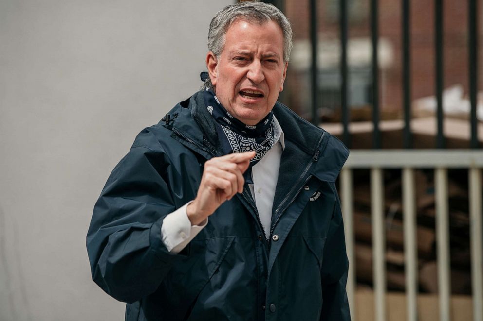 PHOTO: In this April 14, 2020, file photo, New York City Mayor Bill de Blasio speaks at a food pantry organized by The Campaign Against Hunger in Brooklyn.